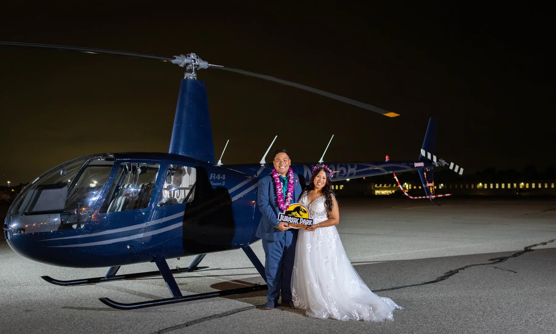 Jed and Azalea beneath the helicopter rotor after dark