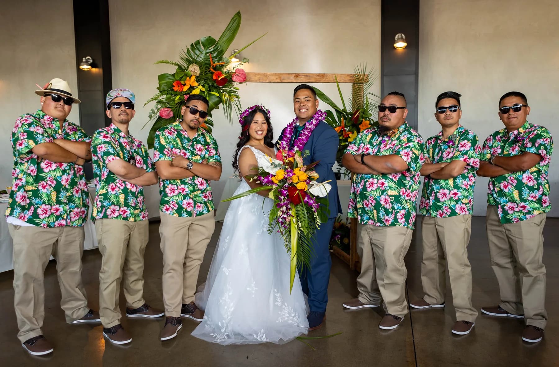 Jed and Azalea with attendants in colorful floral shirts