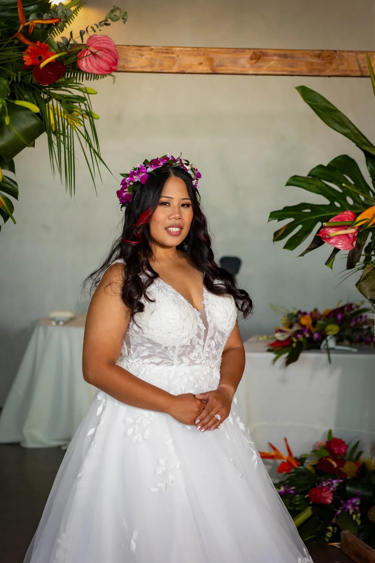 Azalea standing alone beside the colorful ceremony flowers