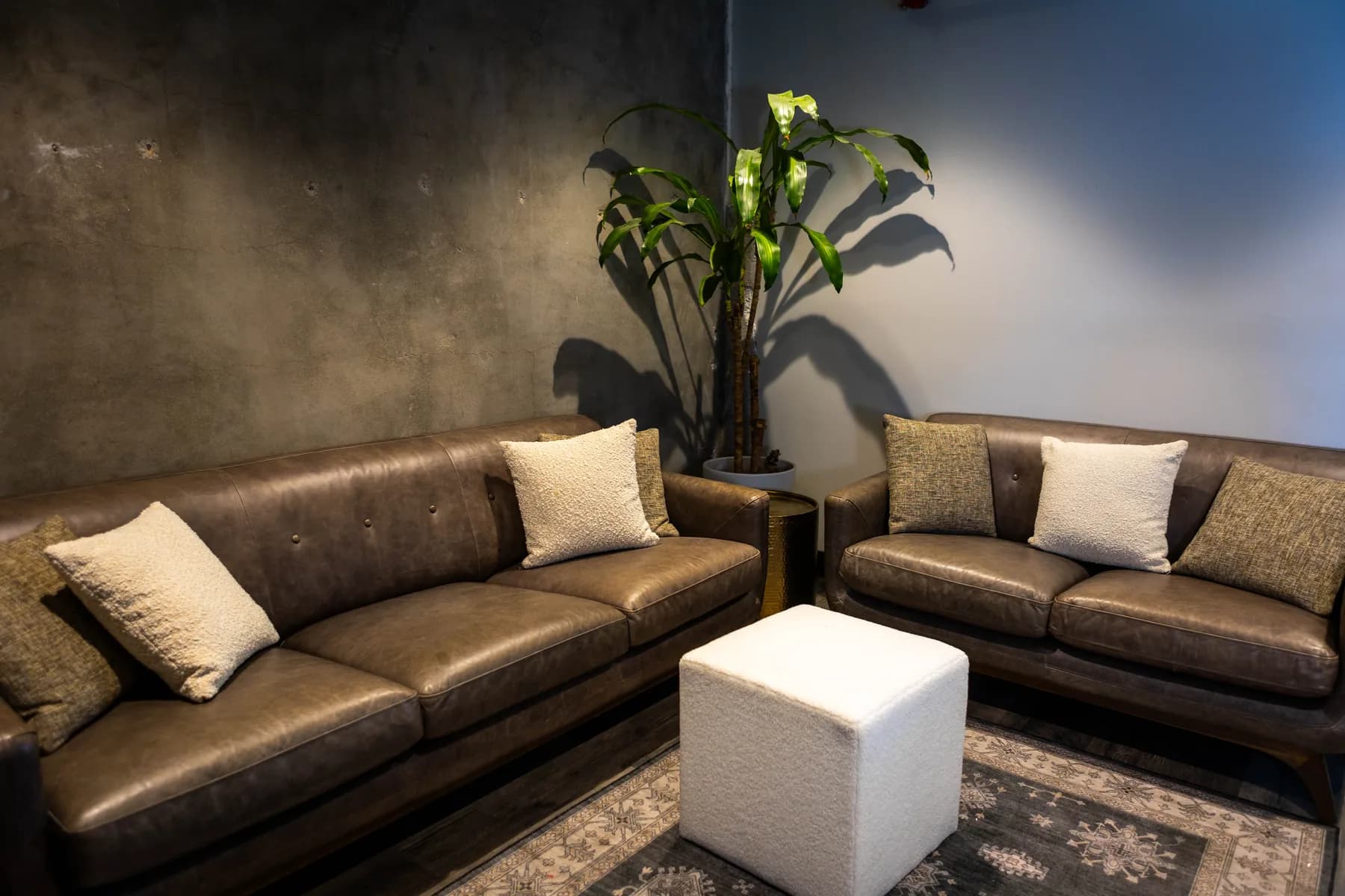 Seating and a concrete wall inside the Hangar 21 South preparation room