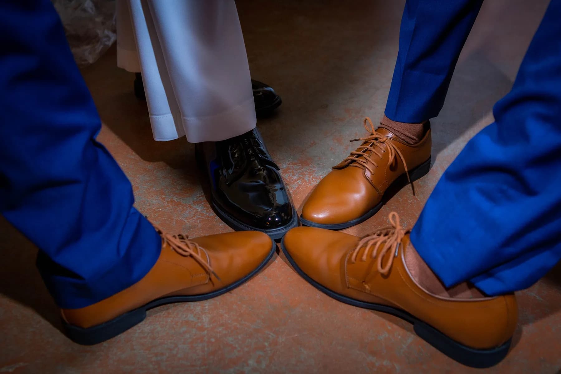 Wedding shoes arranged together on the floor