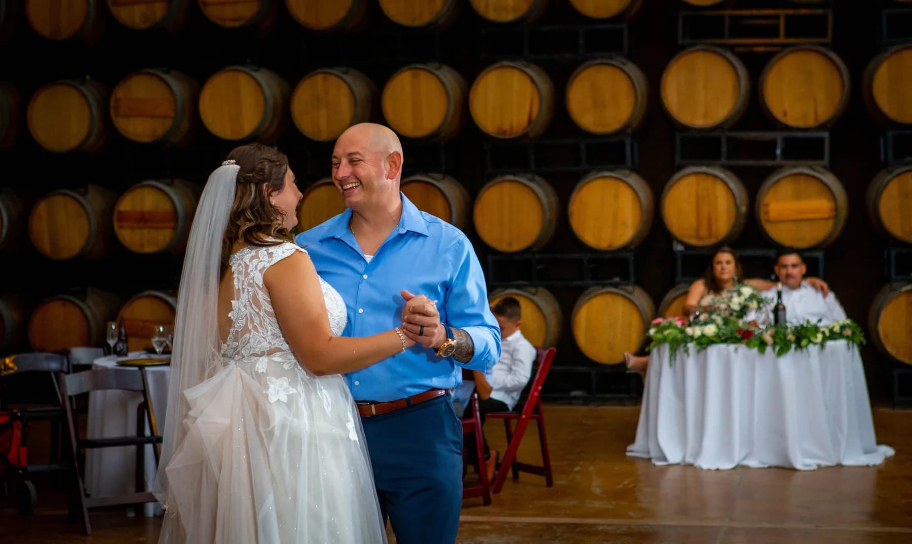 Deidriana dancing with a guest during the reception