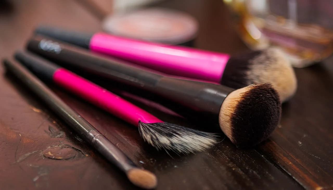 Makeup brushes arranged before preparations