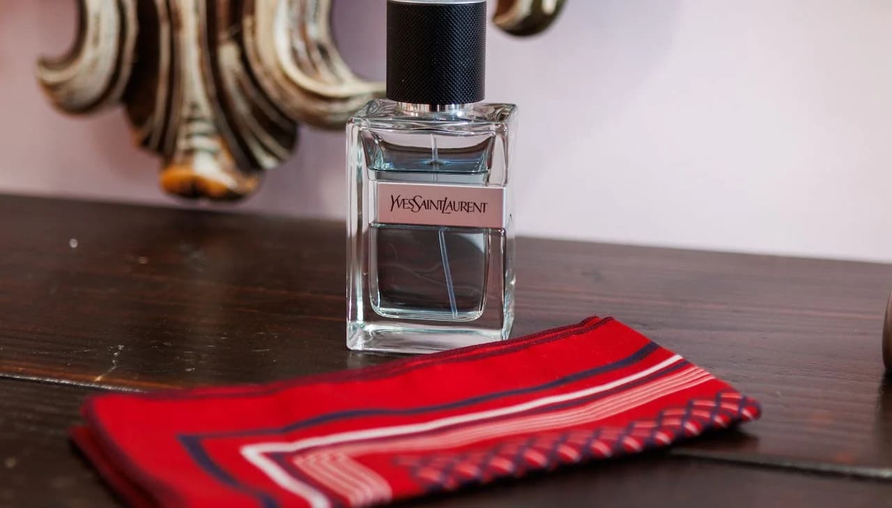 Red accessories and fragrance on a table