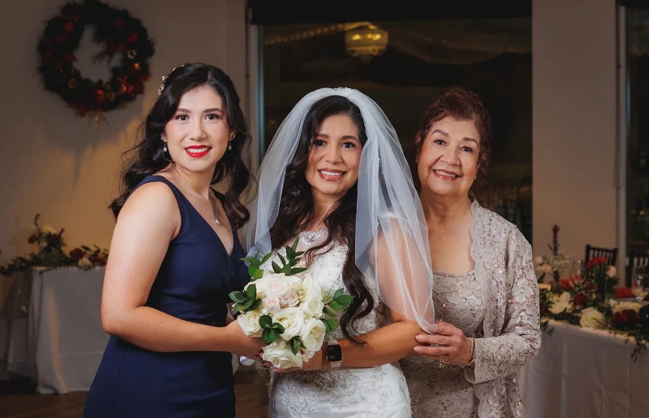 Three women posing together indoors