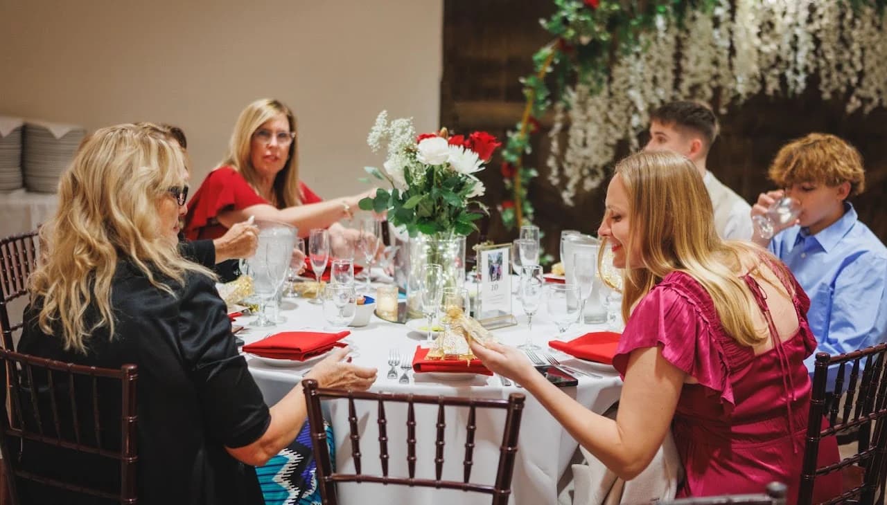 Guests gathered around a reception table