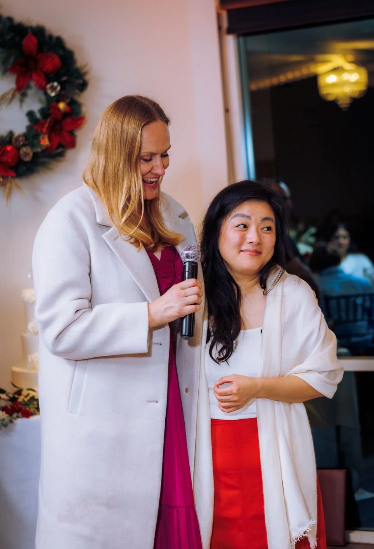 Two women speaking together at the reception