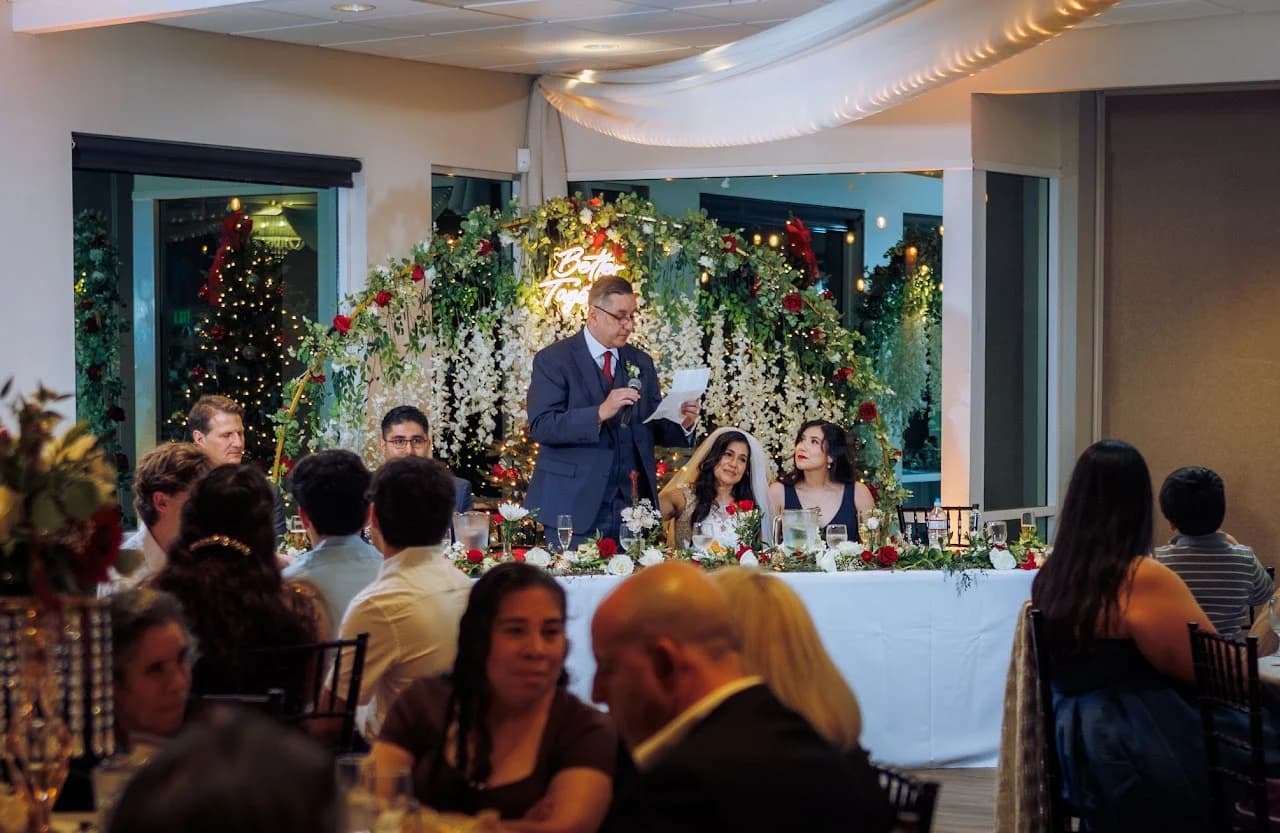 Wide view of guests facing the reception table