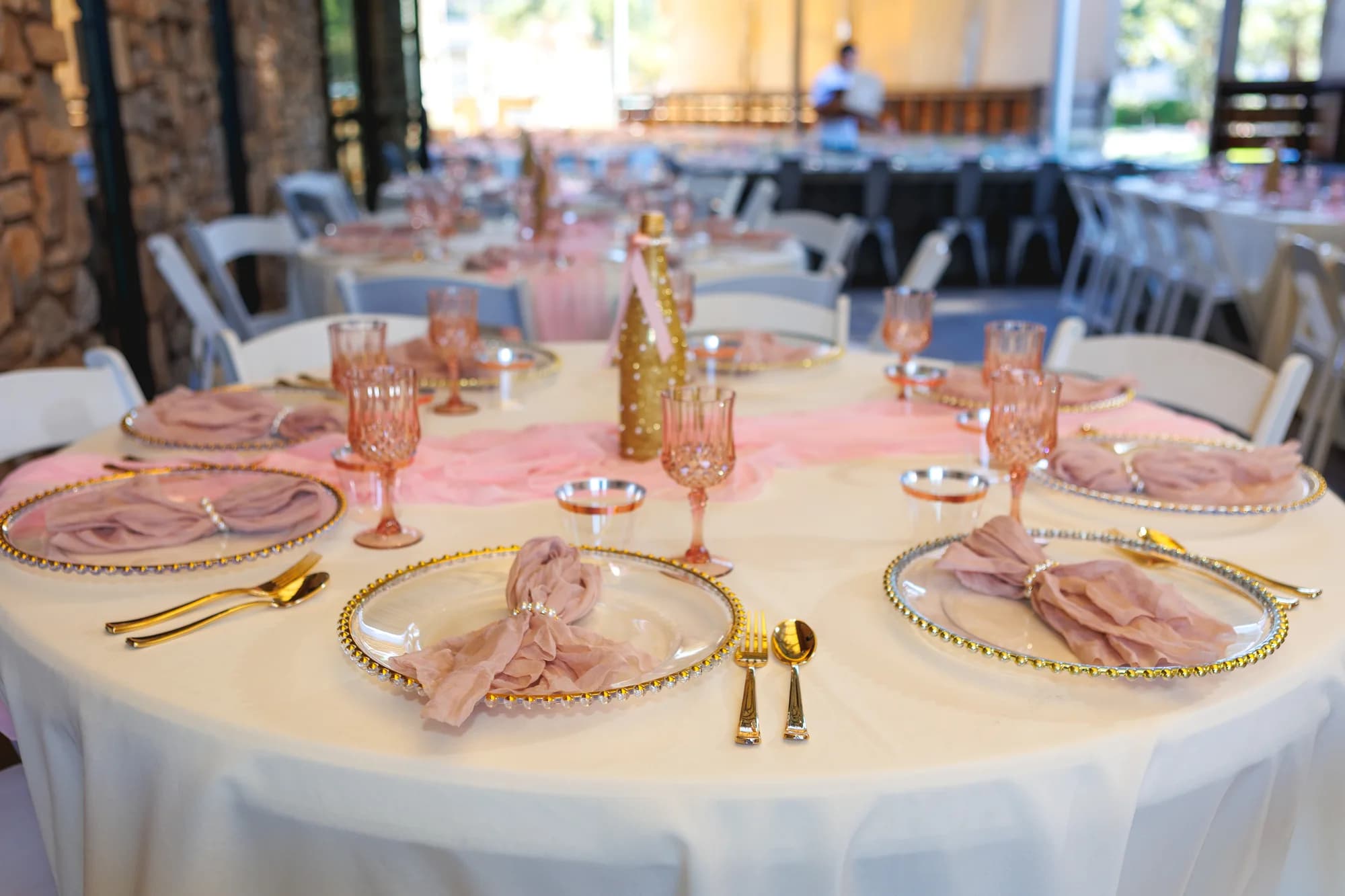 Pink and gold table settings at Temecula Old Town Loft