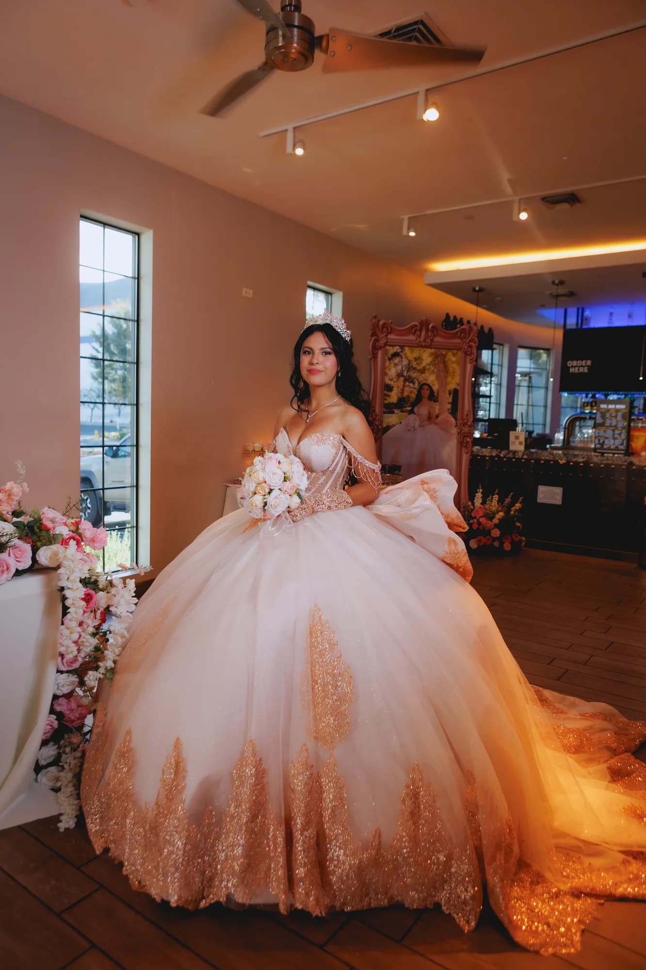 Isabella’s blush gown and train inside the reception room