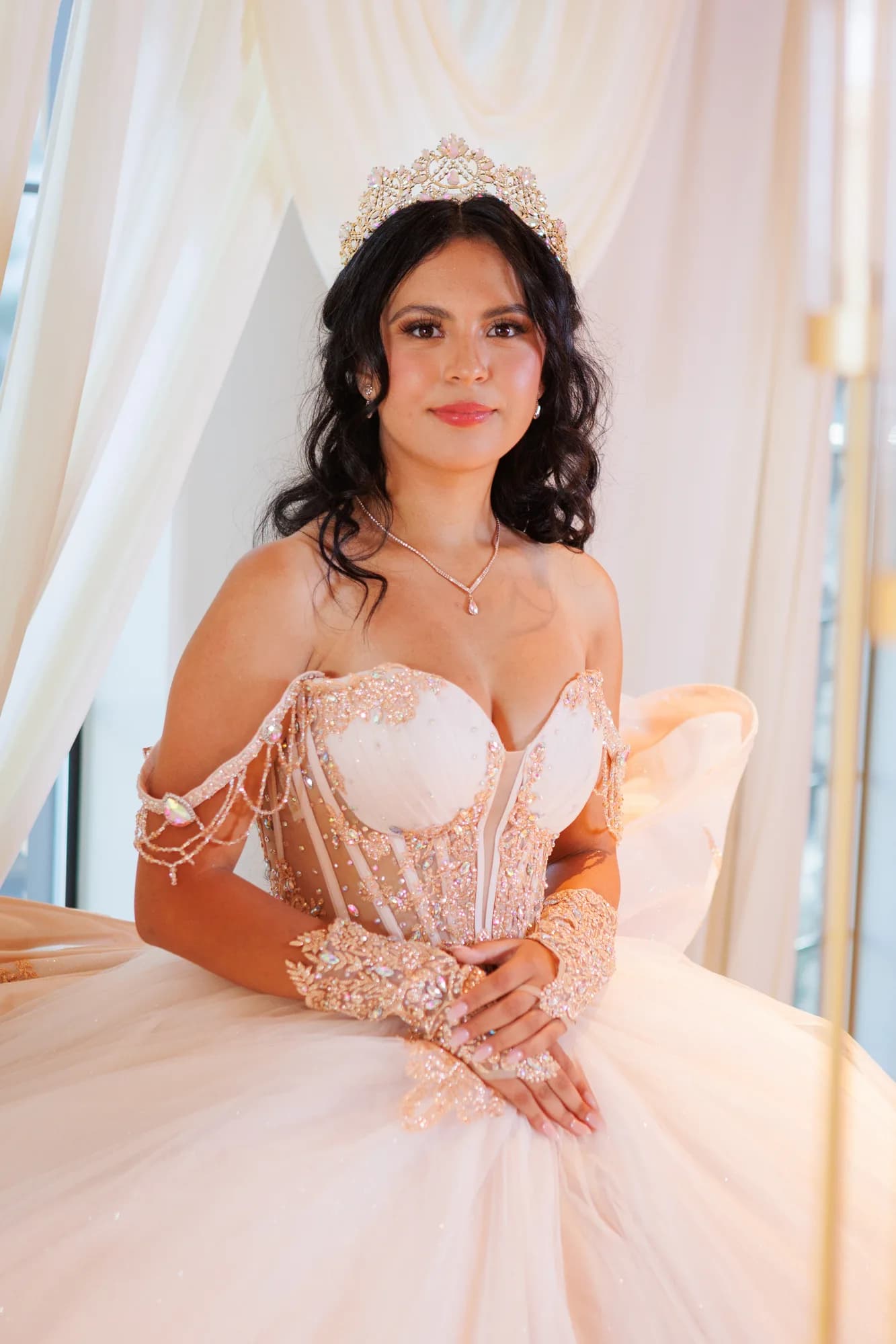 Window-light portrait of Isabella in her blush gown
