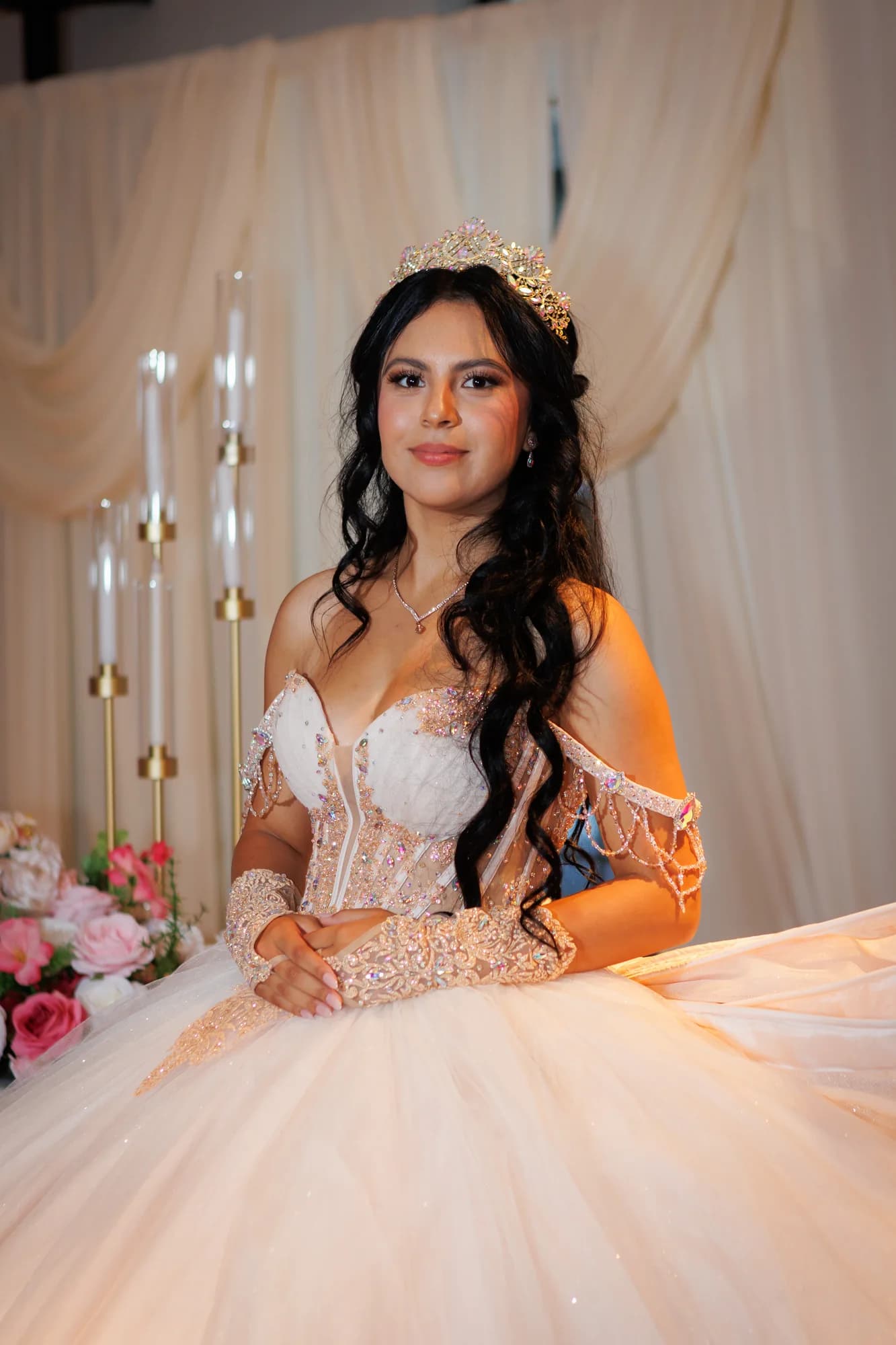 Isabella seated with her bouquet in soft window light