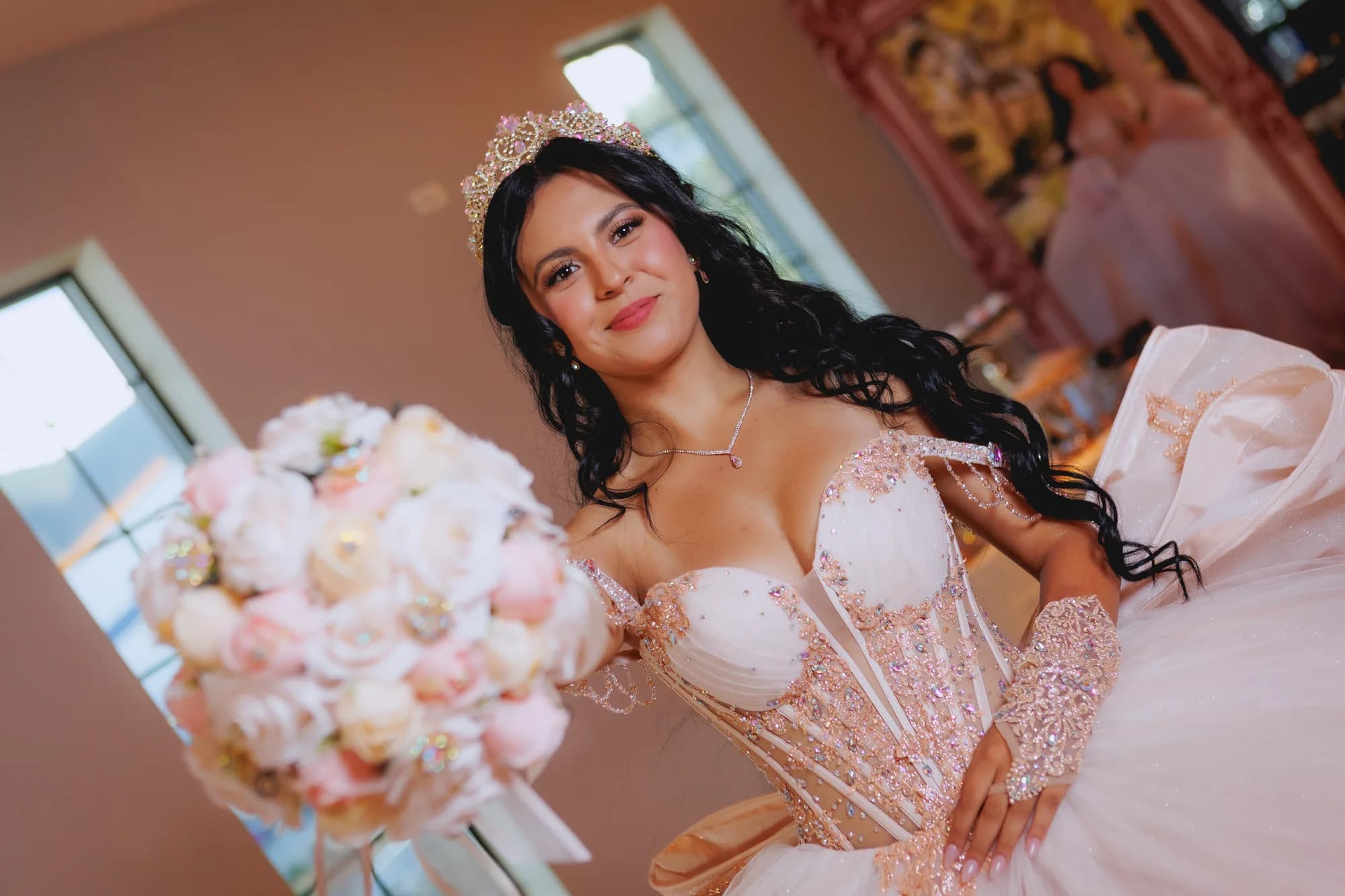 Angled portrait of Isabella holding her bouquet